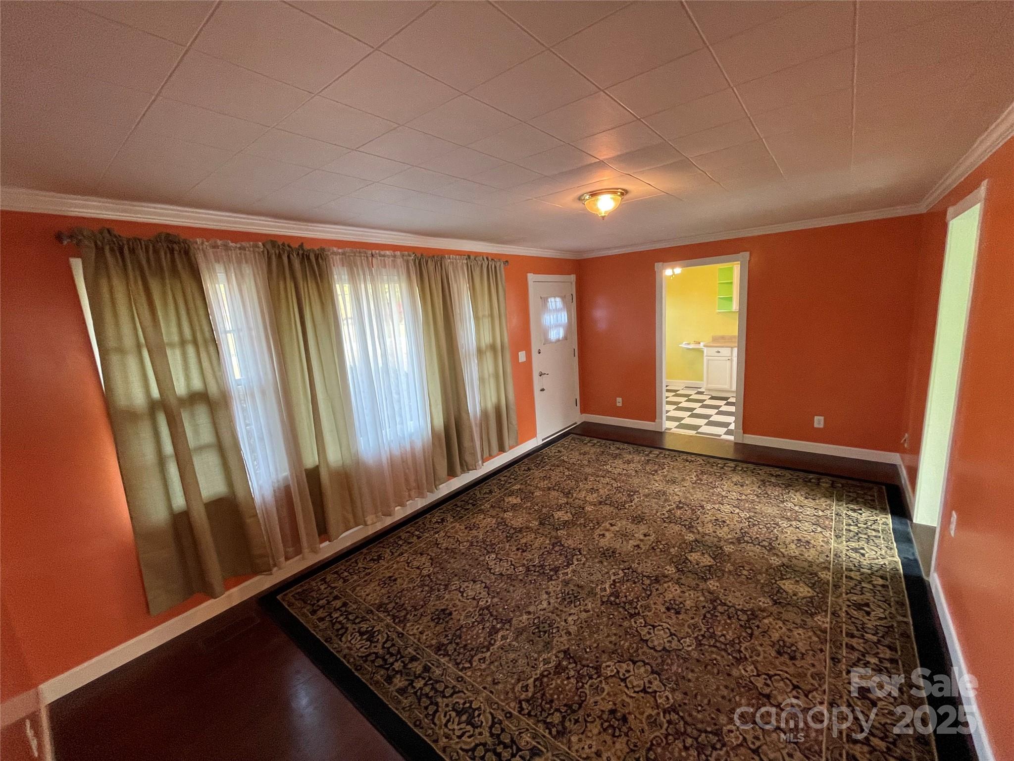 2711 Mooresville Road Salisbury, NC 28147 - Photo 3 of 18 an empty room with windows