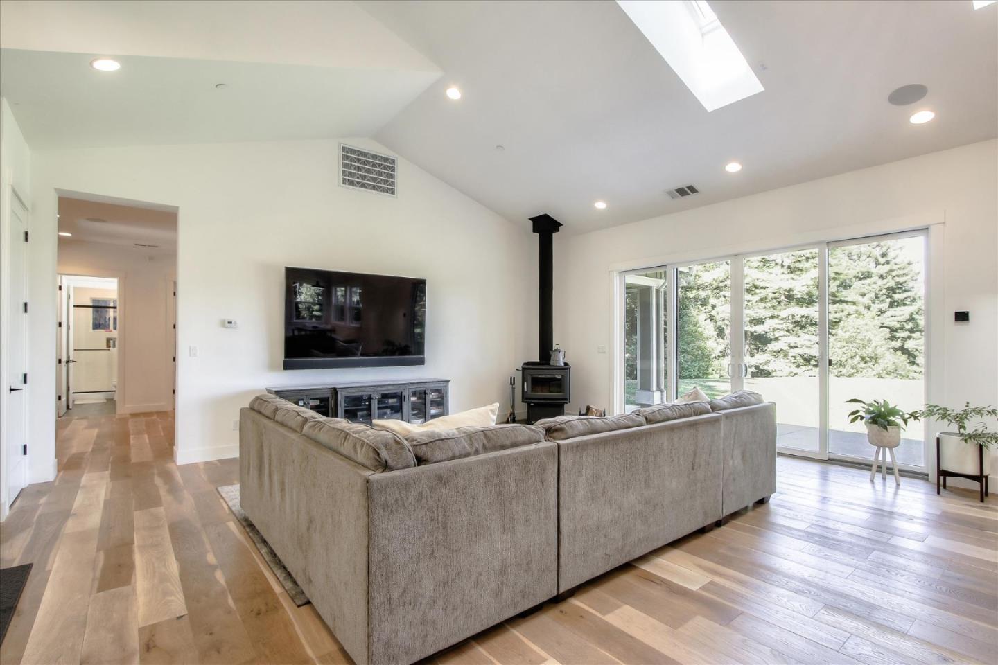 355 McKee Road Felton, CA 95018 - Photo 14 of 71 a living room with furniture and a flat screen tv