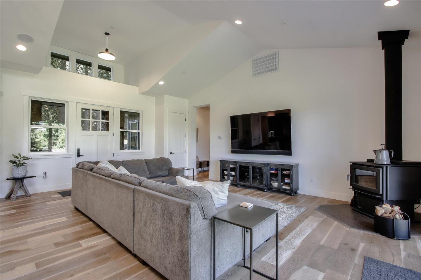 355 McKee Road Felton, CA 95018 - Photo 15 of 71 a living room with furniture and a flat screen tv