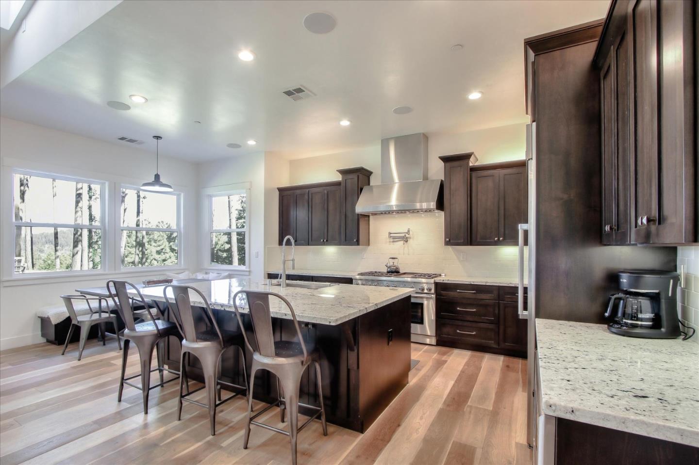 355 McKee Road Felton, CA 95018 - Photo 20 of 71 a large kitchen with lots of counter space a sink appliances and dining table