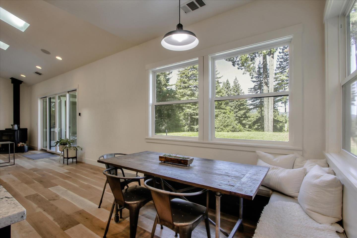 355 McKee Road Felton, CA 95018 - Photo 27 of 71 a view of a dining room with furniture window and outside view
