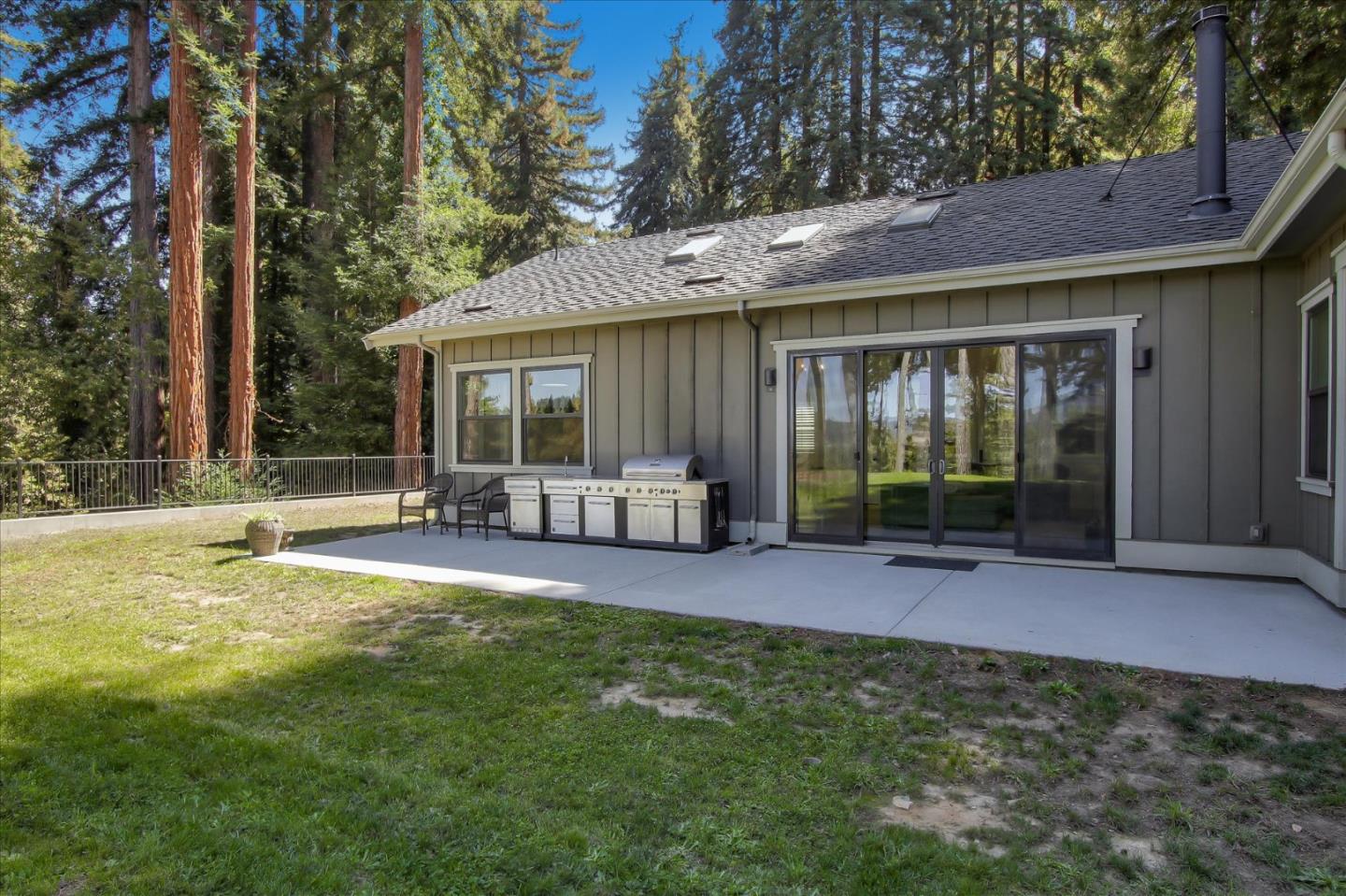 355 McKee Road Felton, CA 95018 - Photo 30 of 71 a view of a house with a yard and sitting area