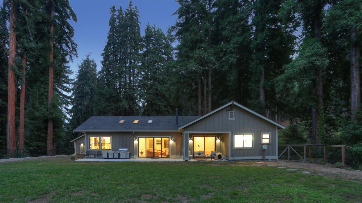 355 McKee Road Felton, CA 95018 - Photo 34 of 71 a front view of a house with a garden and yard