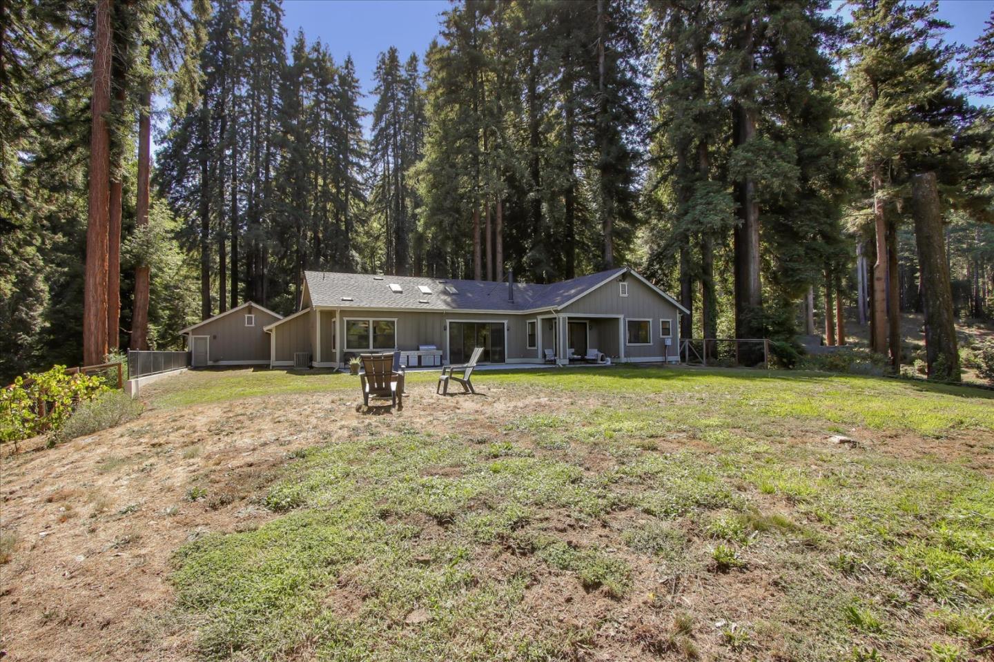 355 McKee Road Felton, CA 95018 - Photo 36 of 71 a house with trees in front of it