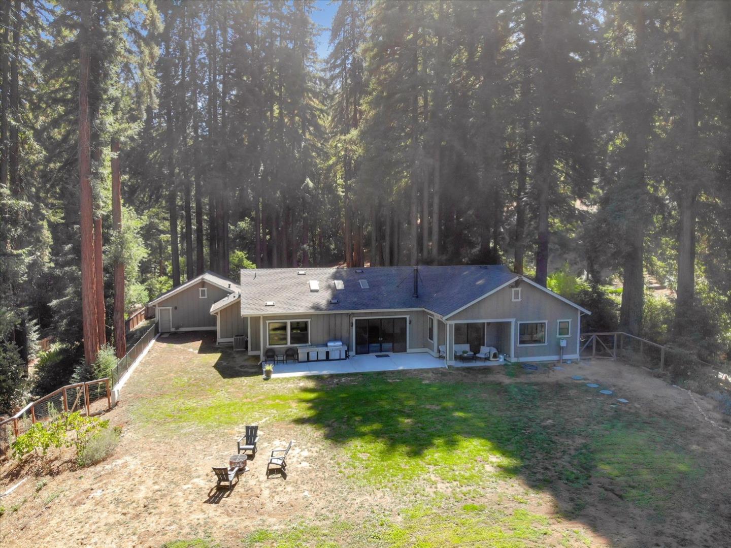 355 McKee Road Felton, CA 95018 - Photo 41 of 71 a front view of house with yard and swimming pool