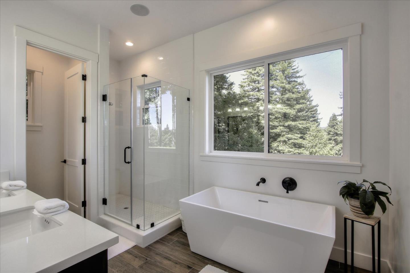 355 McKee Road Felton, CA 95018 - Photo 49 of 71 a bathroom with a bathtub and shower