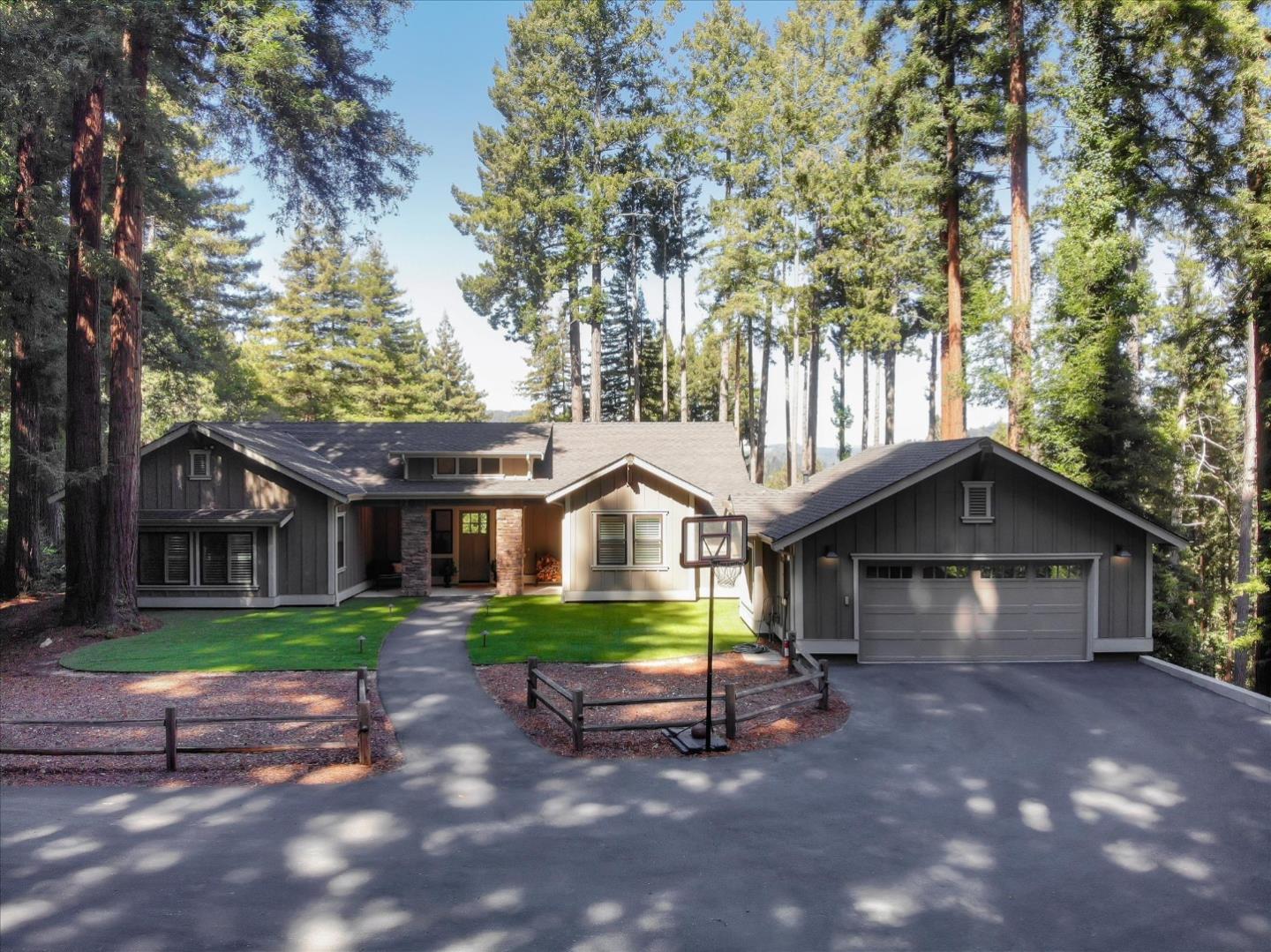 355 McKee Road Felton, CA 95018 - Photo 5 of 71 a front view of a house with a garden and trees