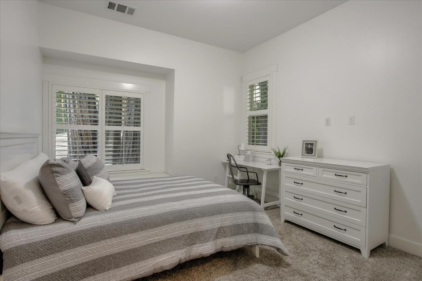 355 McKee Road Felton, CA 95018 - Photo 52 of 71 a bedroom with a bed and a window