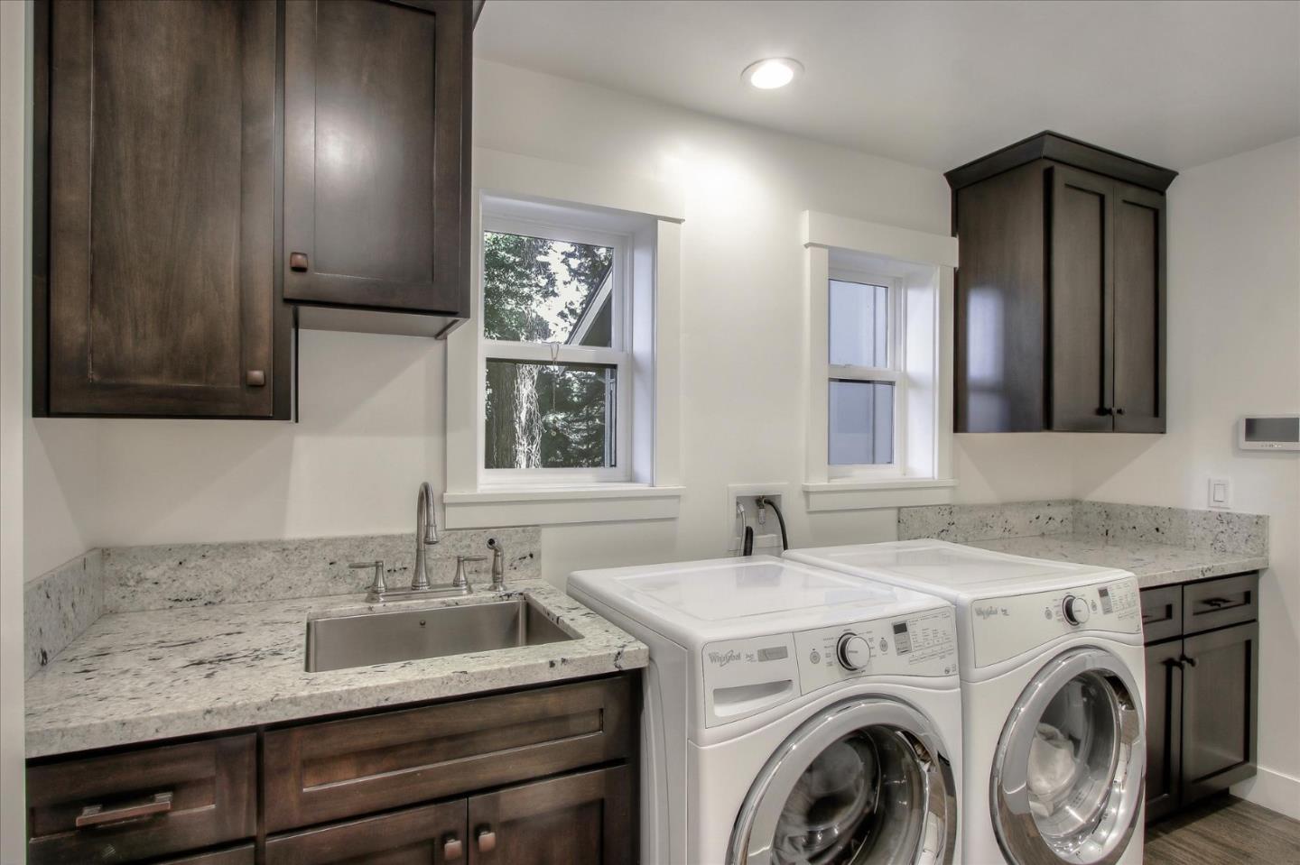355 McKee Road Felton, CA 95018 - Photo 55 of 71 a utility room with sink dryer and washer