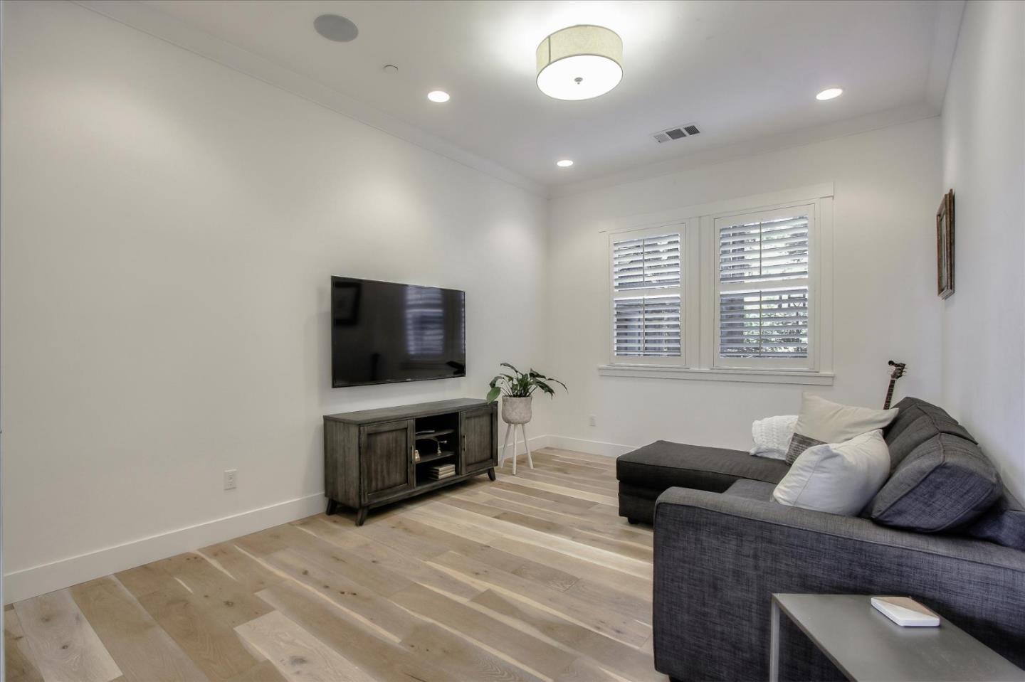 355 McKee Road Felton, CA 95018 - Photo 57 of 71 a living room with furniture and a flat screen tv
