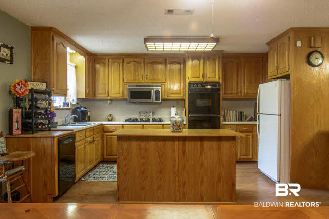 32234 Highway 90 Seminole, AL 36574 - Photo 8 of 22 View of Kitchen from dining area