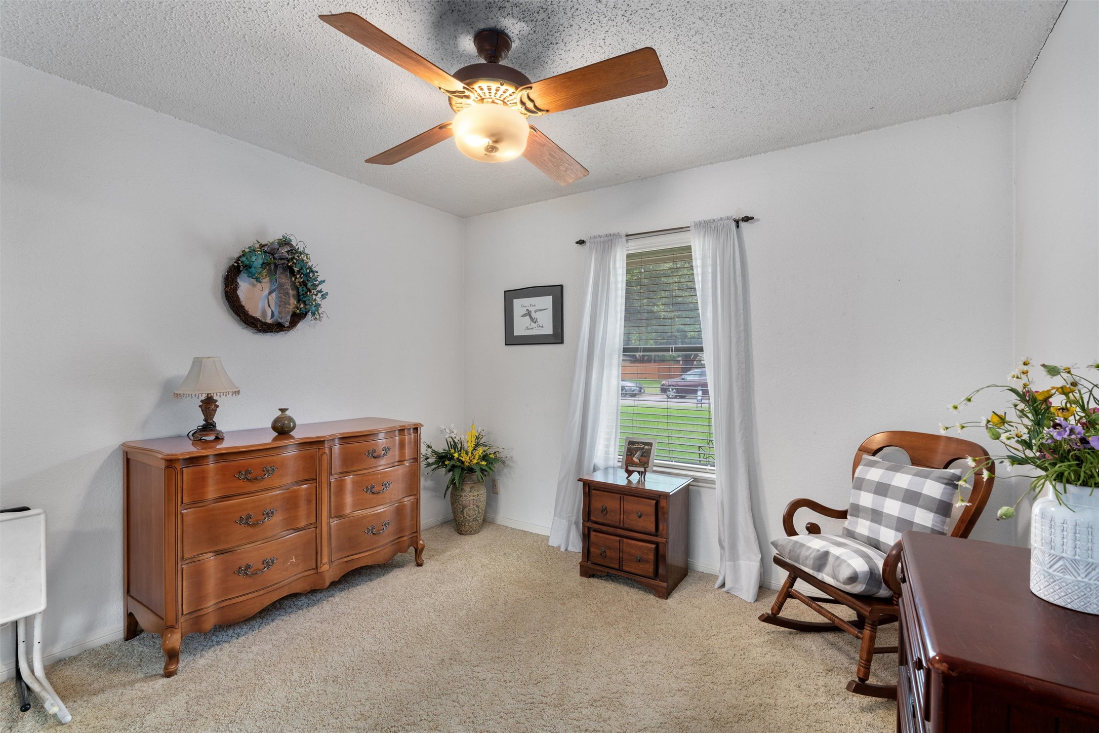 401 Drake Lane Taylor, TX 76574 - Photo 18 of 31 Room featuring light beige carpet flooring and white painted walls