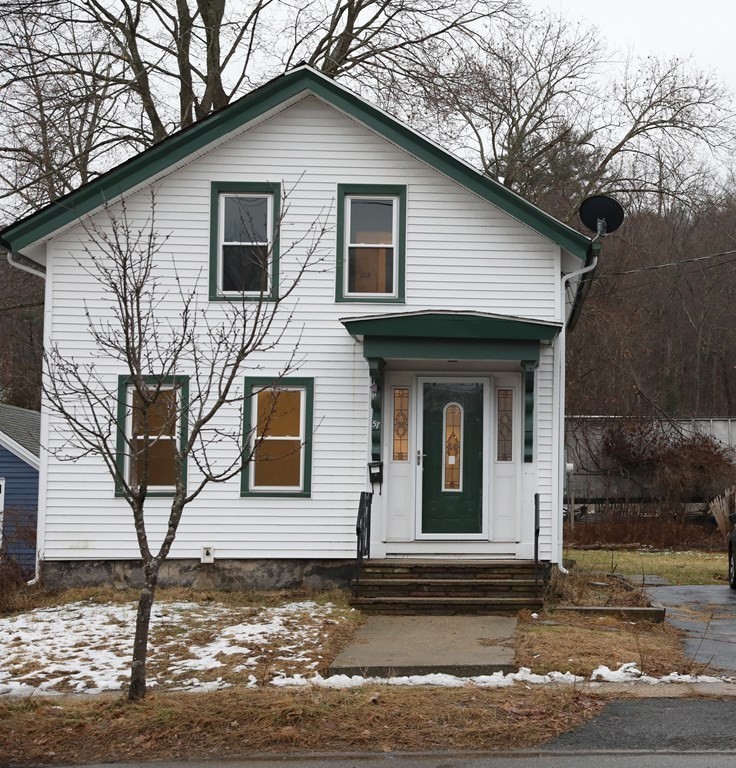 57 Springfield Street Three Rivers, MA 01080 - Photo 1 of 25 a front view of a house with garage