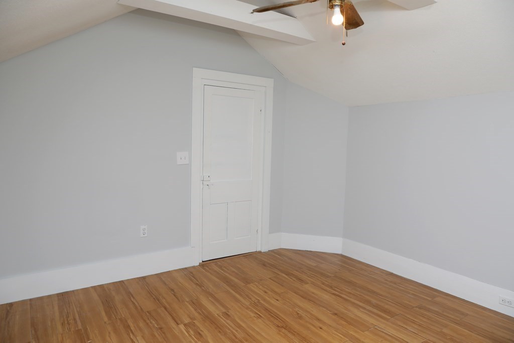 57 Springfield Street Three Rivers, MA 01080 - Photo 16 of 25 a view of an empty room with wooden floor