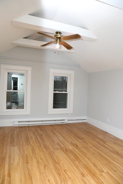 57 Springfield Street Three Rivers, MA 01080 - Photo 17 of 25 a view of an empty room with a window and wooden floor