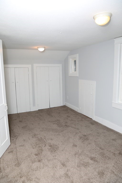 57 Springfield Street Three Rivers, MA 01080 - Photo 19 of 25 an empty room with windows