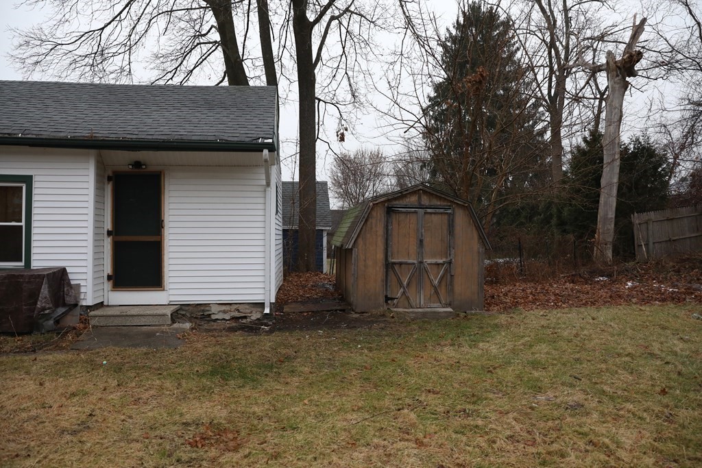57 Springfield Street Three Rivers, MA 01080 - Photo 24 of 25 a house with trees in the background