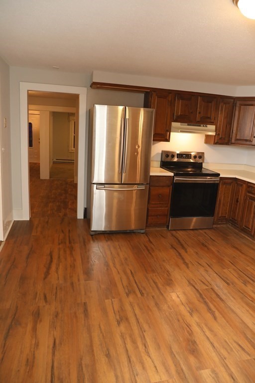 57 Springfield Street Three Rivers, MA 01080 - Photo 8 of 25 a kitchen with a sink and a stove top oven
