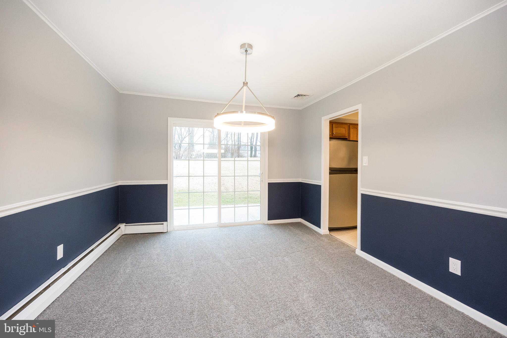 2777 Lantern Lane Audubon, PA 19403 - Photo 12 of 31 Formal Dining Room w/sliders to rear patio