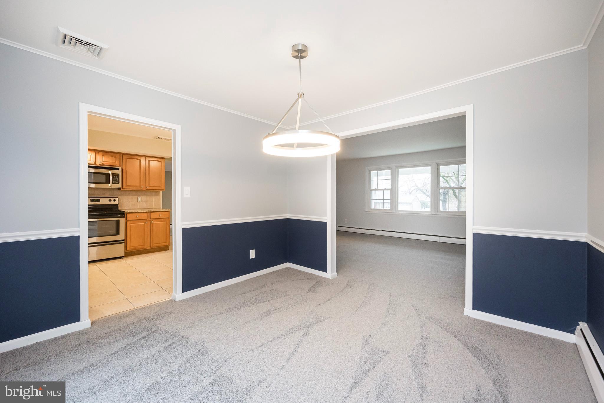 2777 Lantern Lane Audubon, PA 19403 - Photo 13 of 31 Formal Dining Room w/new ceiling light