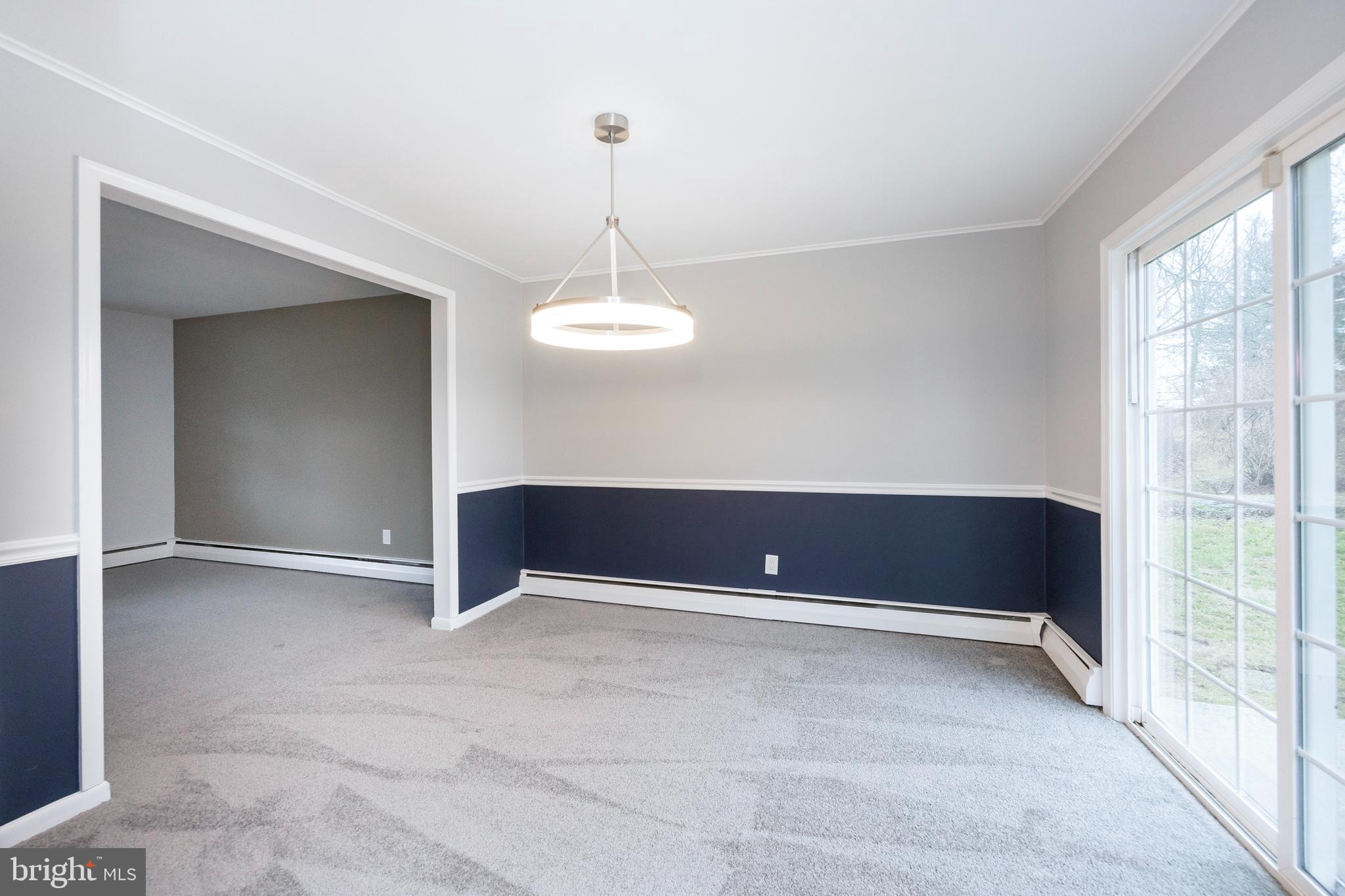 2777 Lantern Lane Audubon, PA 19403 - Photo 14 of 31 Formal Dining Room - hardwood under carpet