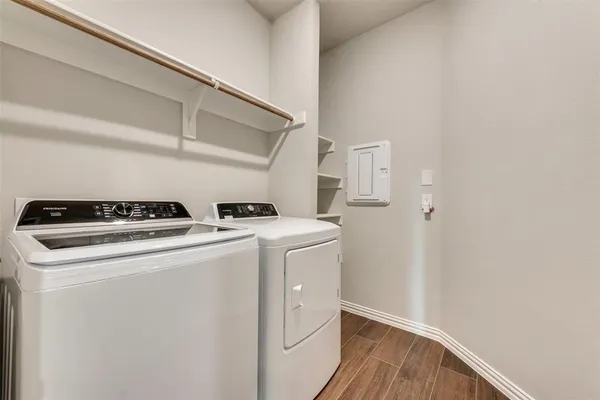 a utility room with dryer and washer