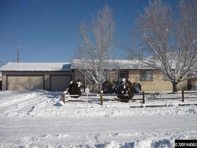 3455 Becard Lane Reno, NV 89508 - Photo 1 of 9 a view of a house with snow on the road