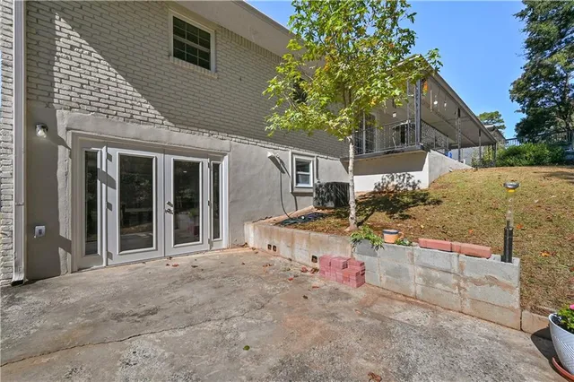 a house view with a backyard space