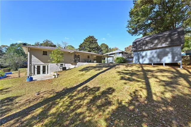 a view of a house with a big yard