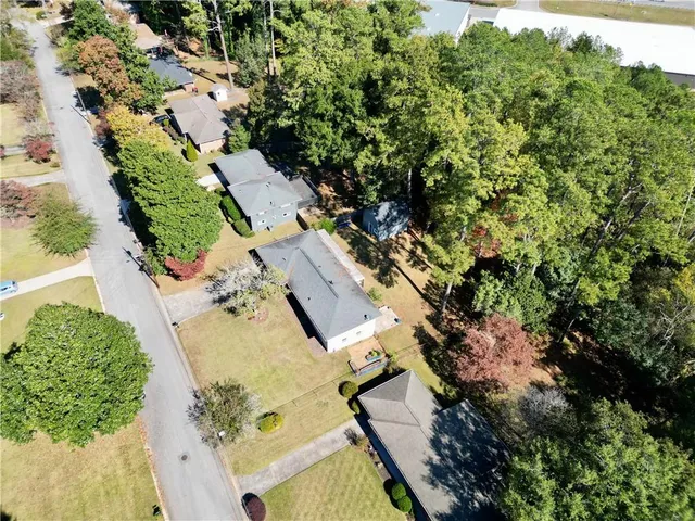 an aerial view of residential house with outdoor space