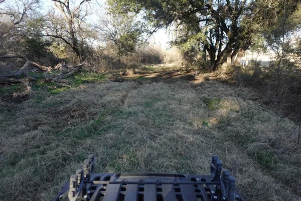 a view of lake with green space