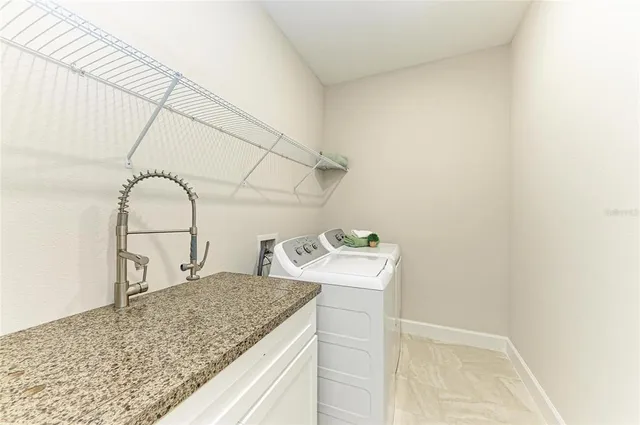 an aerial view of a city with lawn chairs