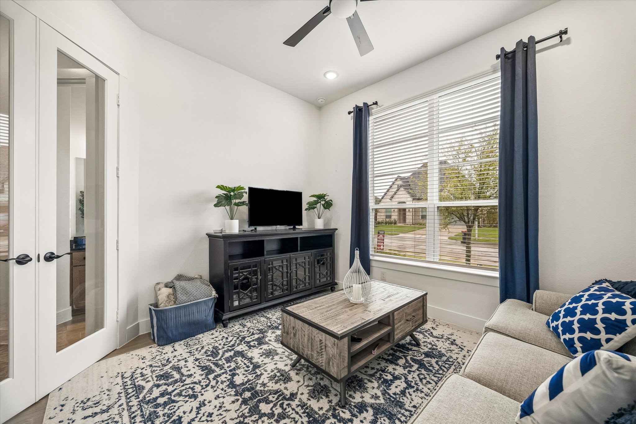 323 Blue River Trail Rosenberg, TX 77471 - Photo 5 of 28 YOUR DEDICATED HOME OFFICE OR FORMAL LIVING SPACE IS AT THE FRONT OF THE HOME WITH GLASS FRENCH DOORS