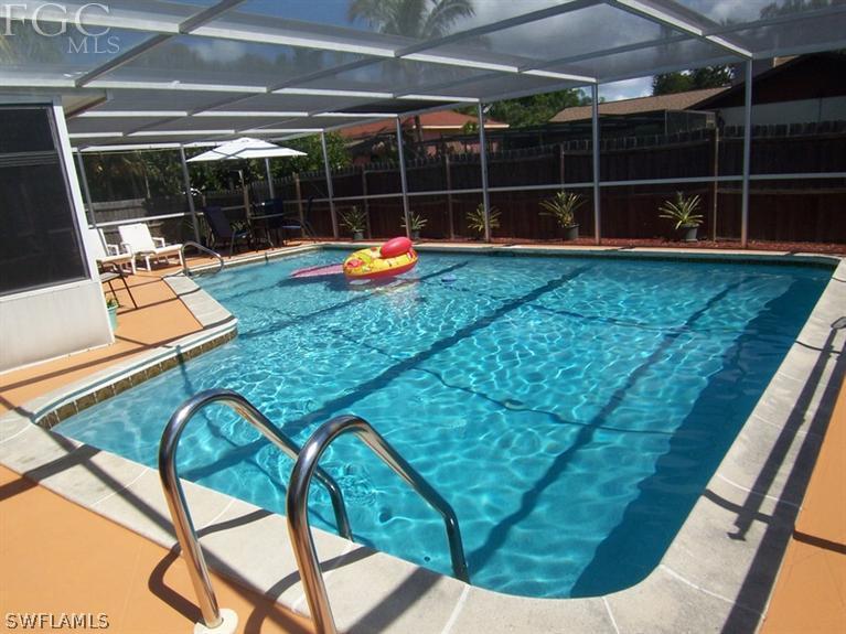 6182 Park Road Fort Myers, FL 33908 - Photo 13 of 15 a view of yard from deck with seating area