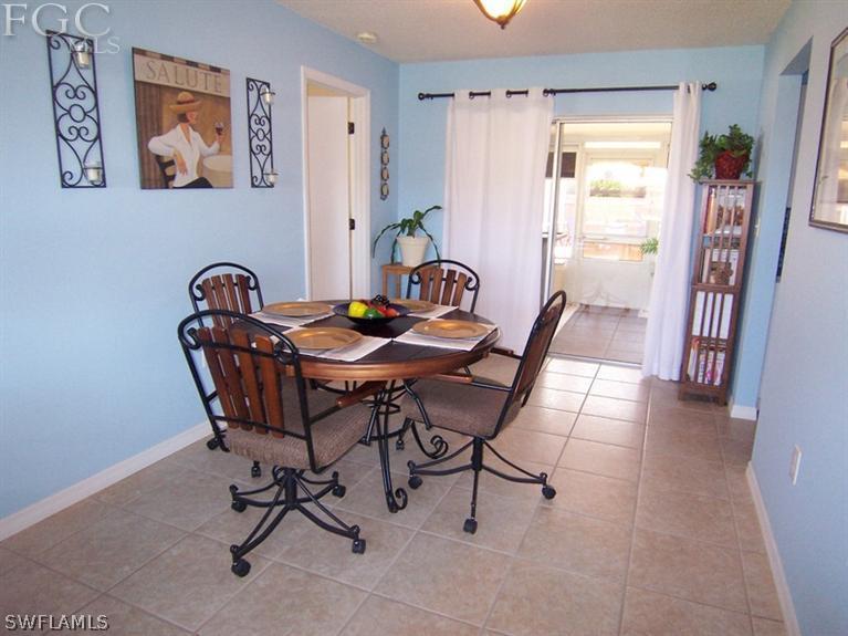 6182 Park Road Fort Myers, FL 33908 - Photo 4 of 15 a dining room with furniture and window