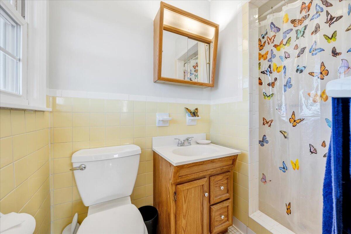 857 Olney Road Vinton, VA 24179 - Photo 15 of 45 a bathroom with a toilet sink and mirror
