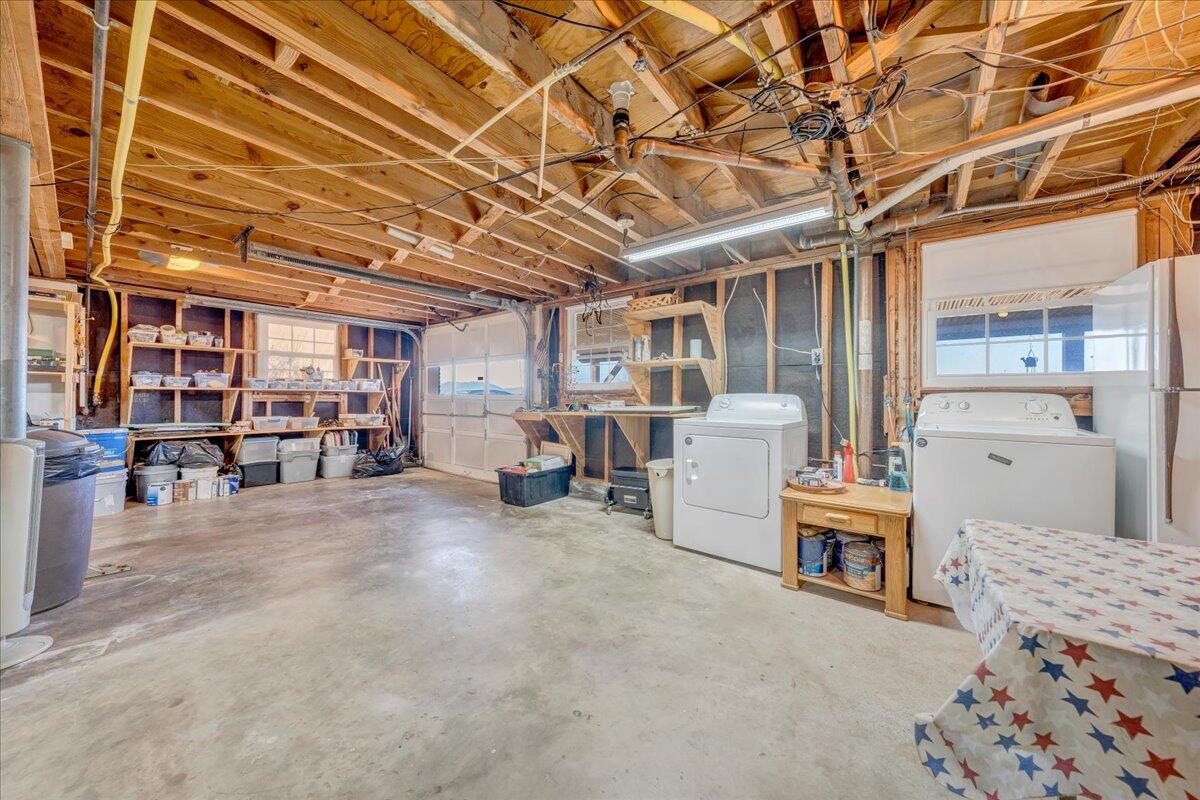 857 Olney Road Vinton, VA 24179 - Photo 19 of 45 a living room with furniture and a chandelier