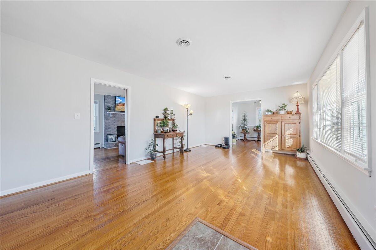 857 Olney Road Vinton, VA 24179 - Photo 2 of 45 a living room with furniture and a wooden floor