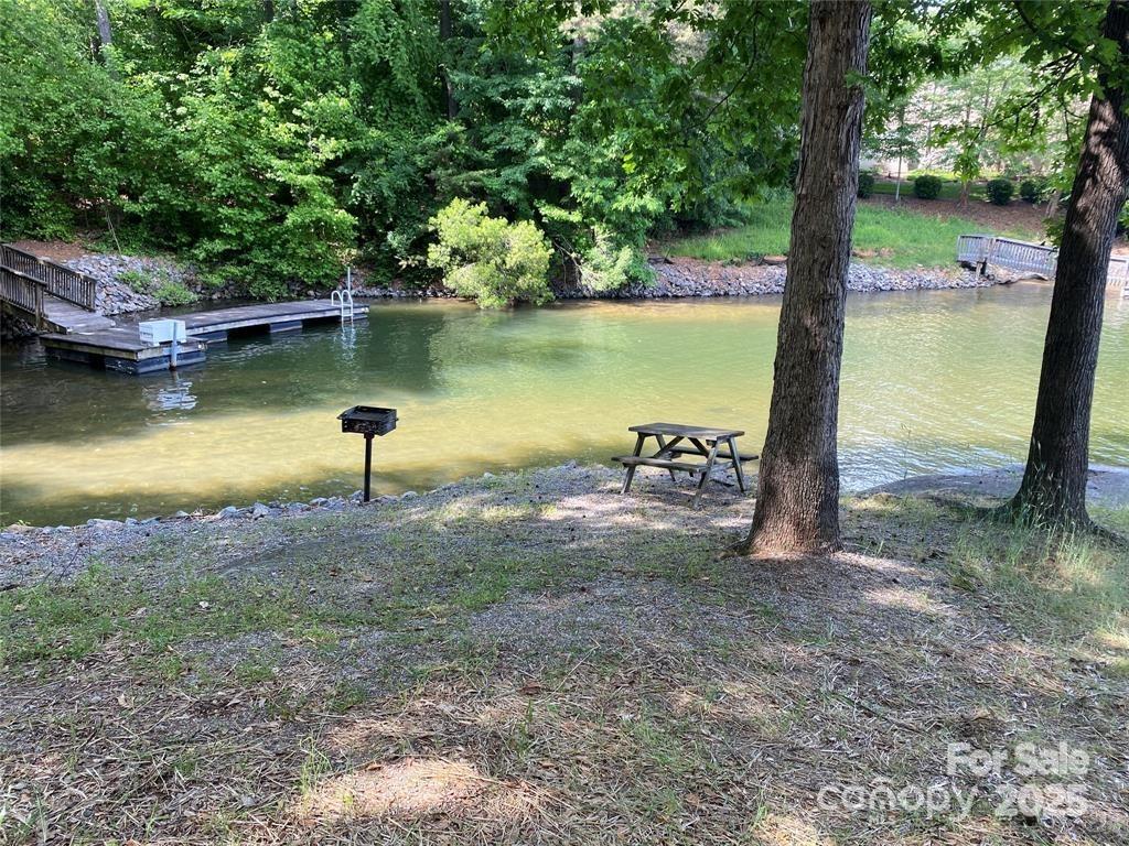8452 Marina Lane Catawba, NC 28609 - Photo 2 of 7 a view of a lake with a yard