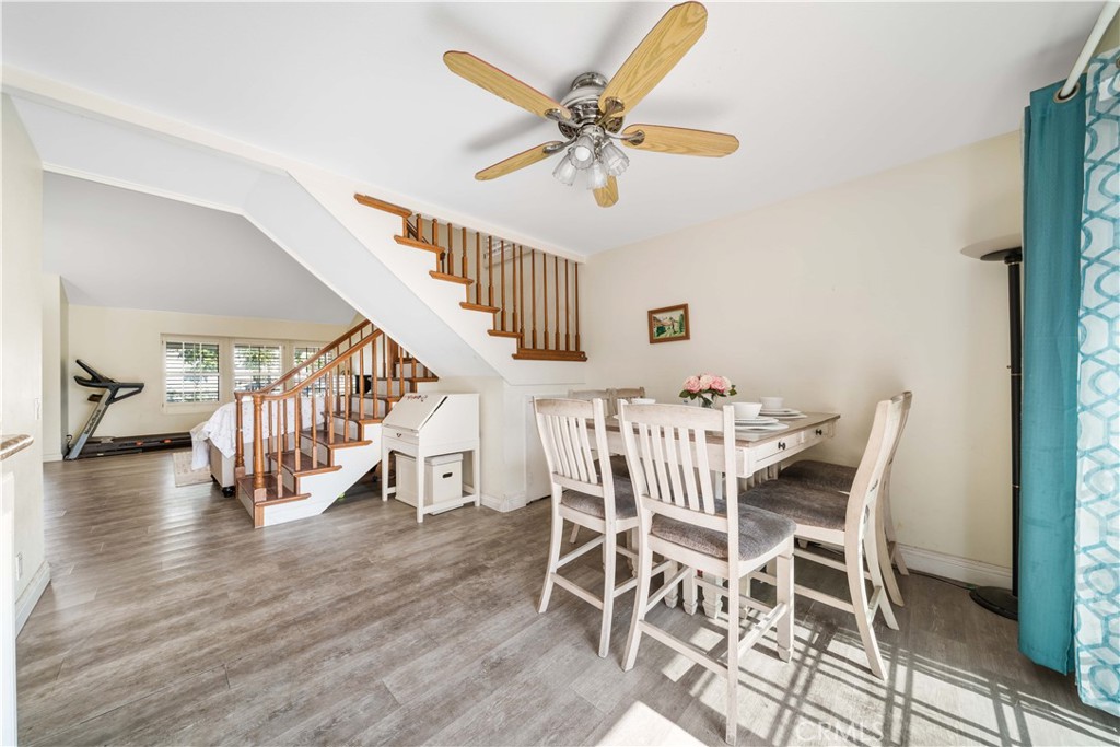 38 Carver Irvine, CA 92620 - Photo 13 of 55 a view of a dining room with furniture and wooden floor