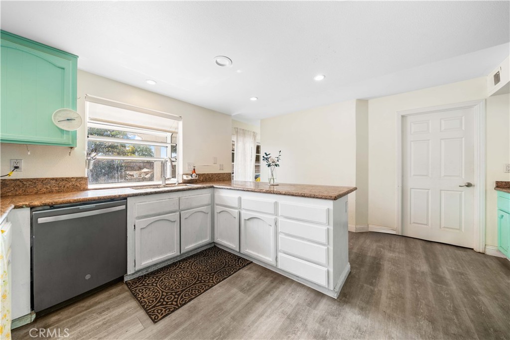 38 Carver Irvine, CA 92620 - Photo 15 of 55 a kitchen with sink cabinets and window