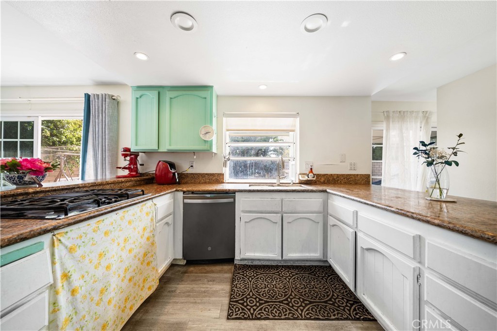 38 Carver Irvine, CA 92620 - Photo 16 of 55 a kitchen with a sink stove and cabinets