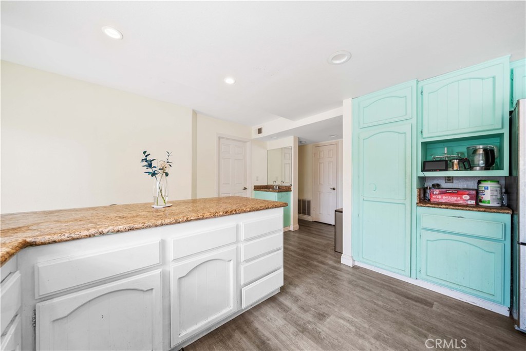 38 Carver Irvine, CA 92620 - Photo 18 of 55 a bathroom with a granite countertop sink and a mirror