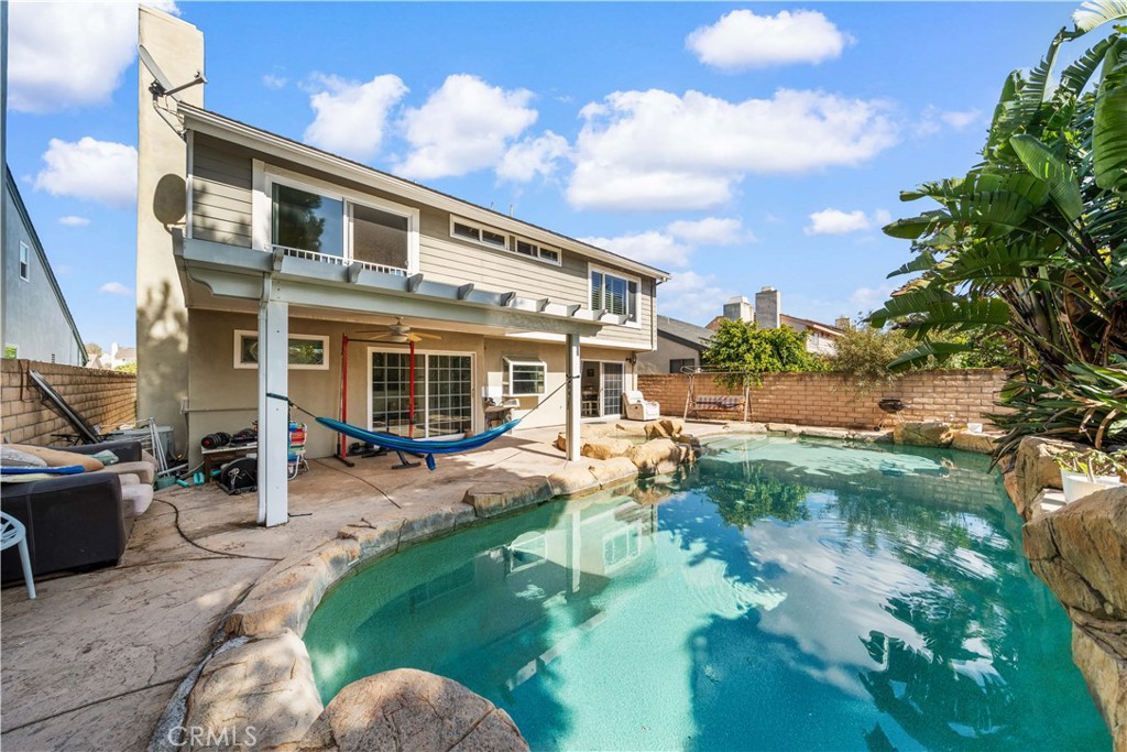 38 Carver Irvine, CA 92620 - Photo 24 of 55 a backyard of a house with yard table and chairs