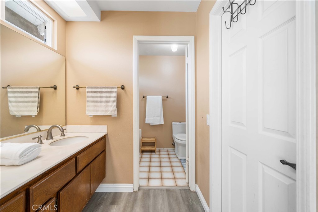 38 Carver Irvine, CA 92620 - Photo 31 of 55 a bathroom with a sink a toilet and shower