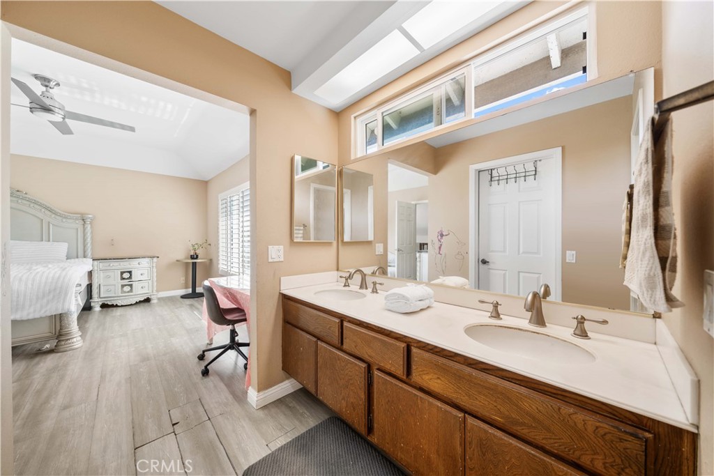 38 Carver Irvine, CA 92620 - Photo 33 of 55 a spacious bathroom with a double vanity sink mirror and toilet
