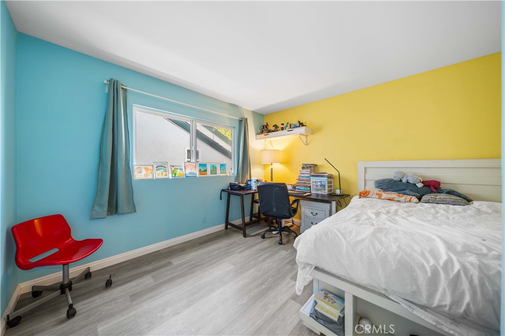 38 Carver Irvine, CA 92620 - Photo 36 of 55 a bedroom with a bed and a window