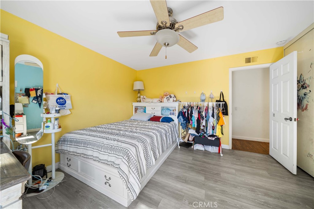 38 Carver Irvine, CA 92620 - Photo 39 of 55 a bed room with a bed and a chair