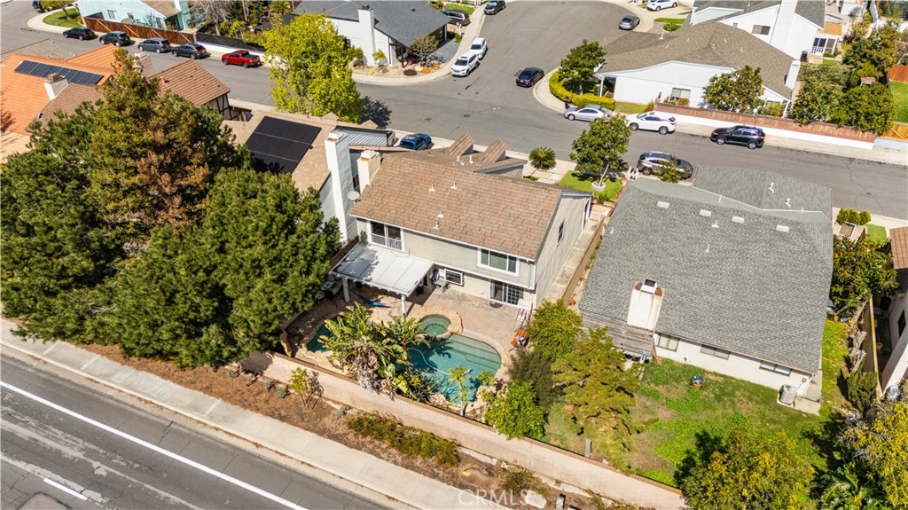 38 Carver Irvine, CA 92620 - Photo 42 of 55 an aerial view of a house with a yard and a large parking space