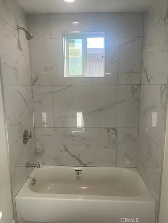 a bathroom with a bathtub